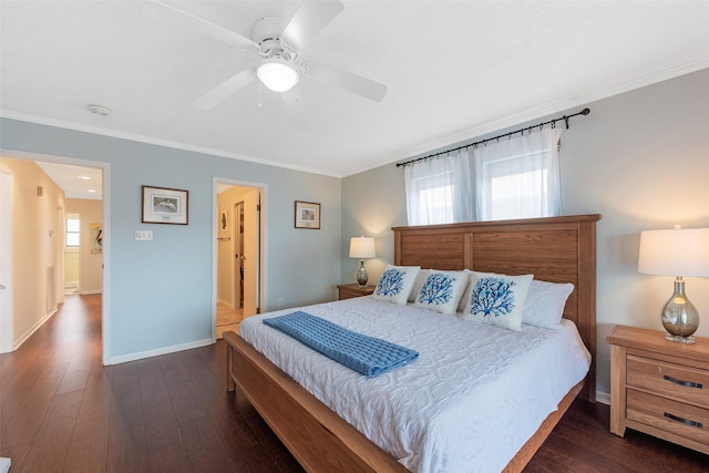 bedroom with ornamental molding, ceiling fan, and dark hardwood / wood-style flooring