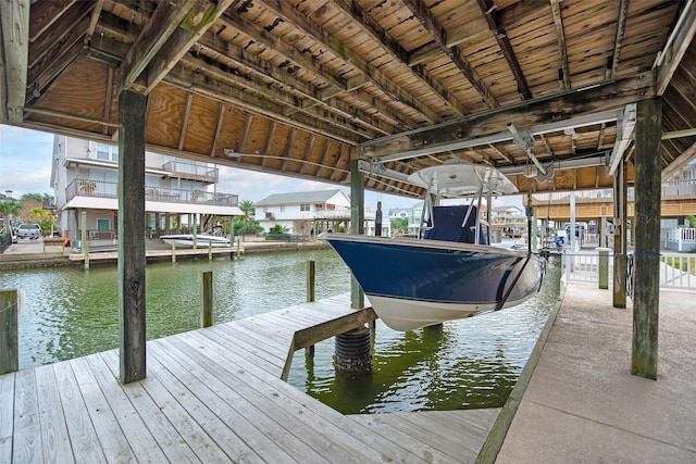 dock area featuring a water view