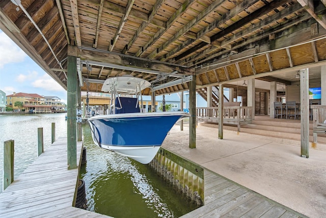 view of dock with a water view