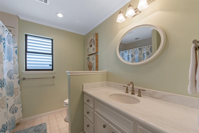 bathroom featuring vanity, toilet, crown molding, and tile patterned flooring