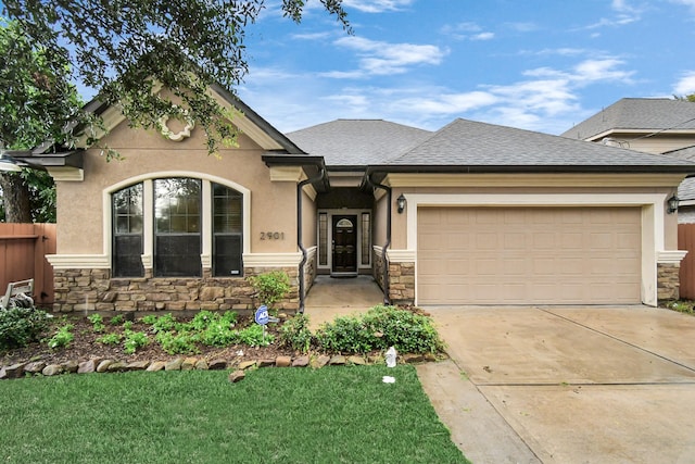 view of front of home with a garage