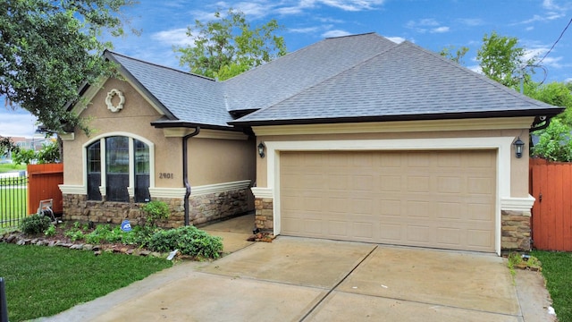 view of front of home with a garage