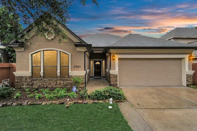 view of front of home with a garage