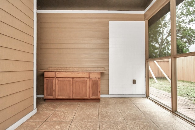 unfurnished sunroom with a healthy amount of sunlight