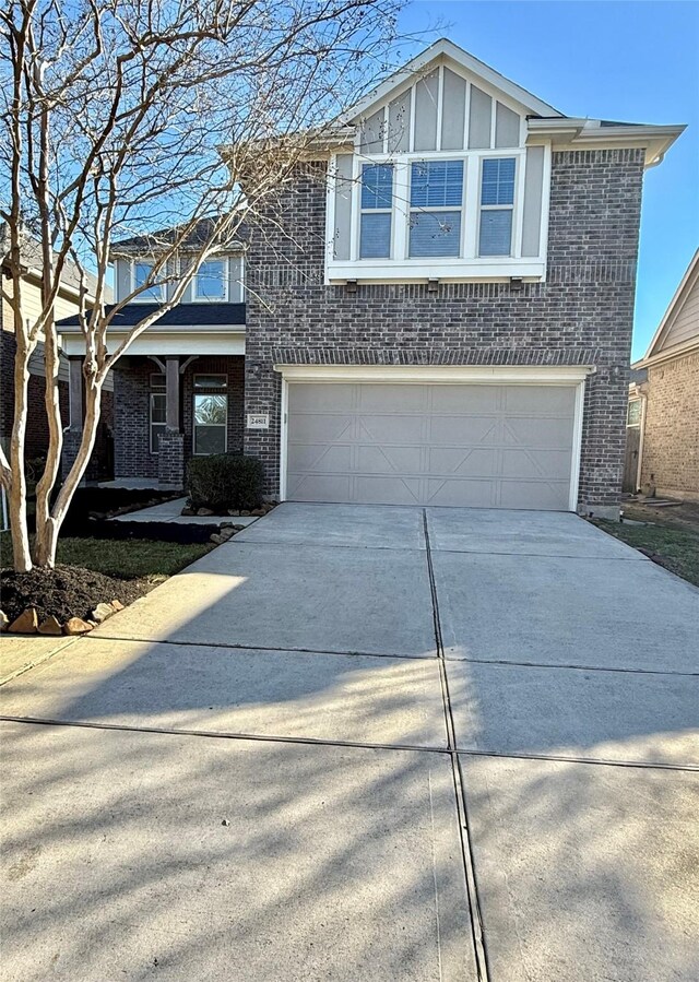 view of front of property featuring a garage