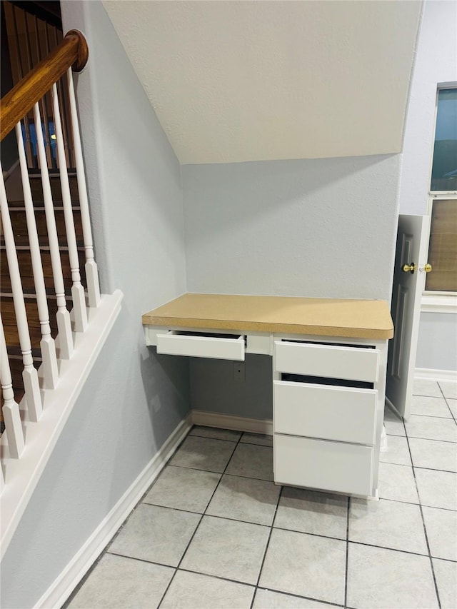 tiled office space with built in desk