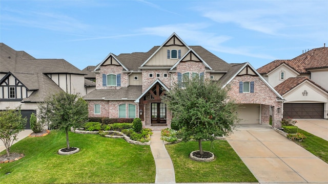 view of front facade with a garage and a front yard