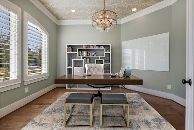 office featuring ornamental molding, hardwood / wood-style floors, and a notable chandelier