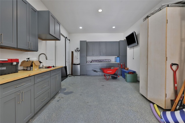 kitchen with gray cabinets and sink