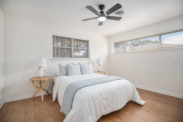 bedroom featuring ceiling fan and wood-type flooring