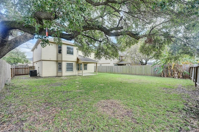 view of yard featuring central AC