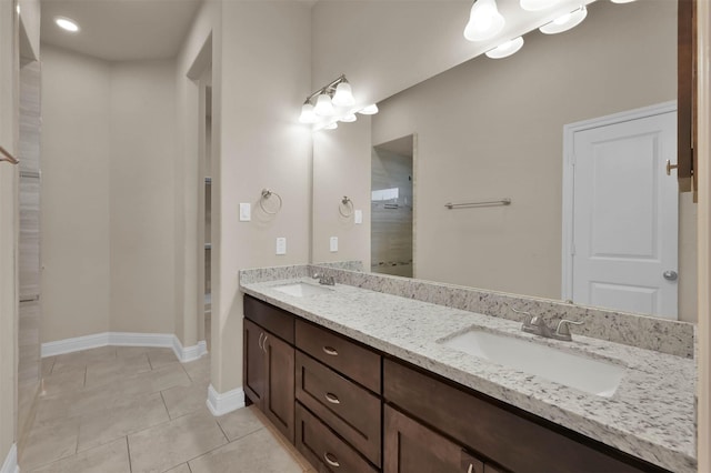 bathroom featuring vanity and tile patterned flooring