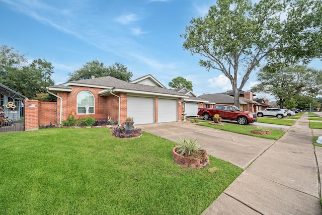 ranch-style home with a garage and a front lawn