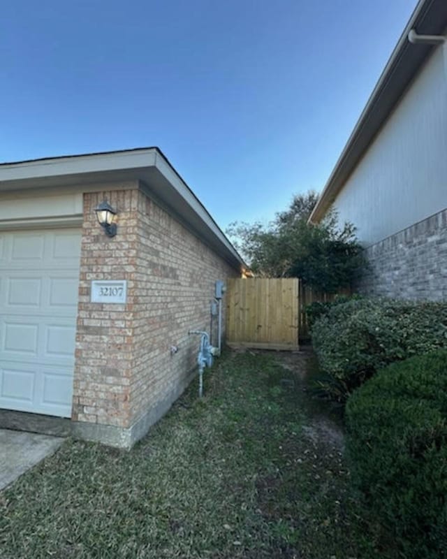 view of property exterior with a garage