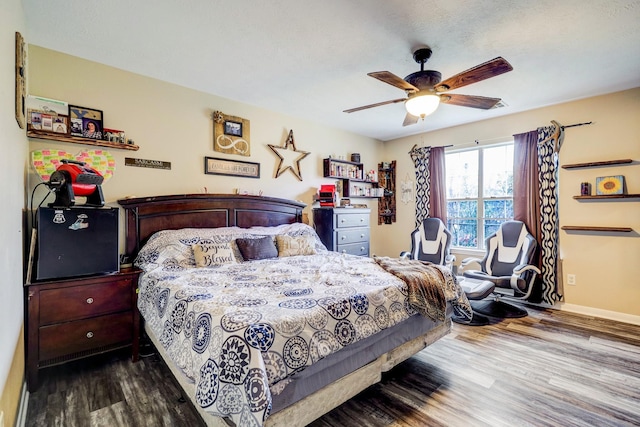 bedroom featuring ceiling fan and hardwood / wood-style floors