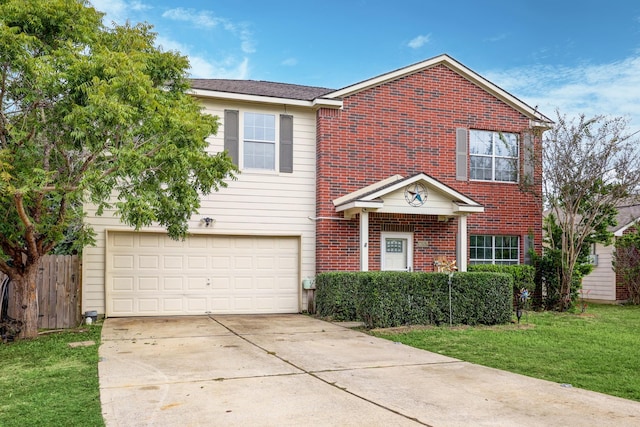 view of front of property featuring a garage and a front lawn