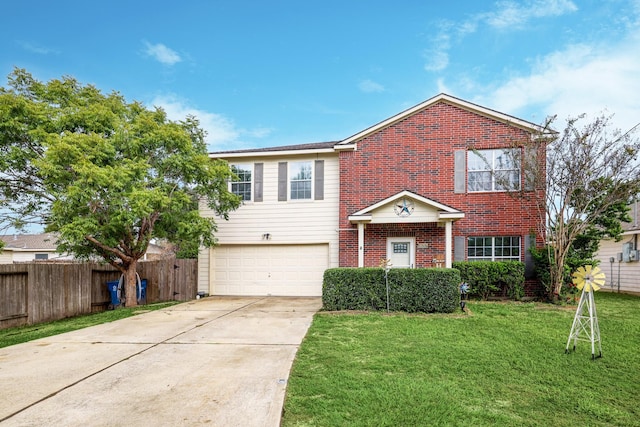 view of front of property featuring a garage and a front yard