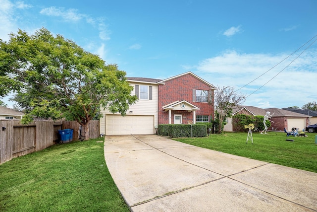 view of front of house featuring a garage and a front yard