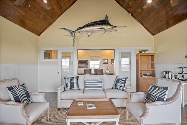 tiled living room with wooden ceiling, high vaulted ceiling, and ceiling fan