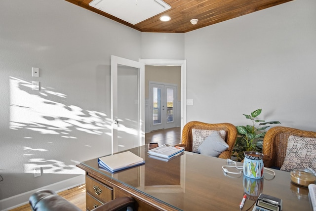 home office with french doors and wooden ceiling