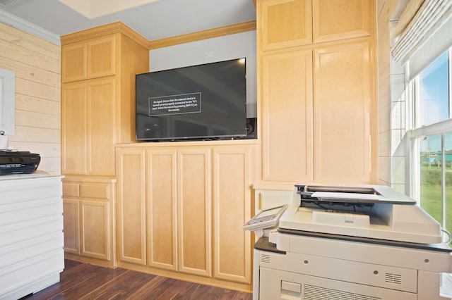 kitchen featuring dark wood-type flooring, crown molding, light brown cabinetry, and wood walls