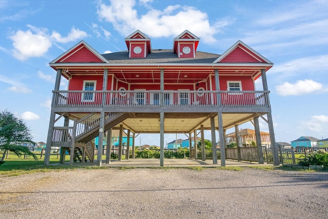 view of front of property with a wooden deck