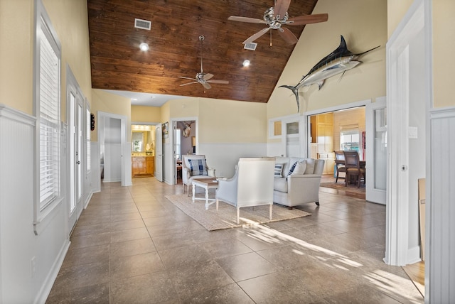 interior space featuring wood ceiling and high vaulted ceiling