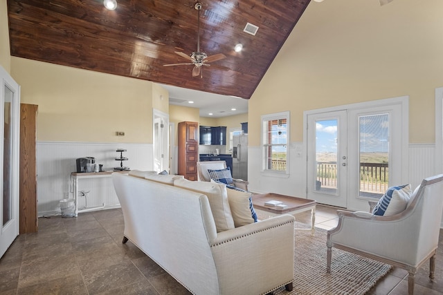 living room with wood ceiling, ceiling fan, high vaulted ceiling, and french doors