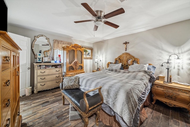 bedroom with ceiling fan and dark wood-type flooring