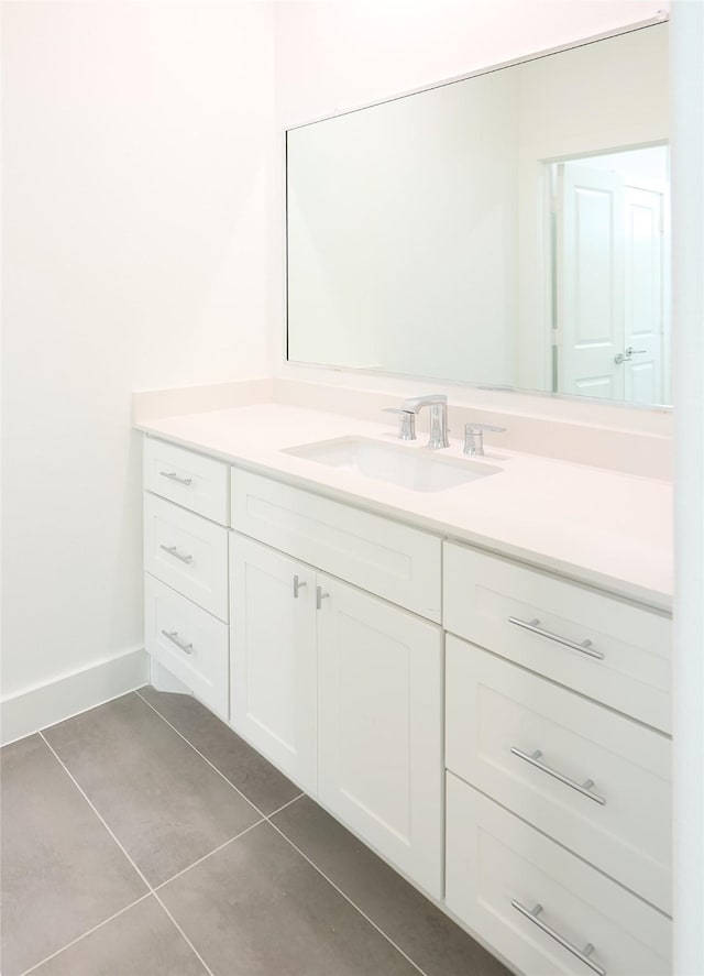 bathroom featuring tile patterned floors and vanity