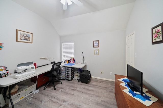 office space with light wood-type flooring, vaulted ceiling, and ceiling fan