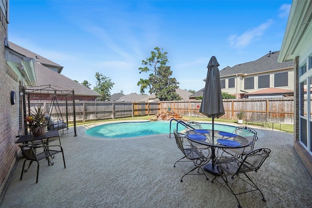 view of pool featuring a gazebo and a patio