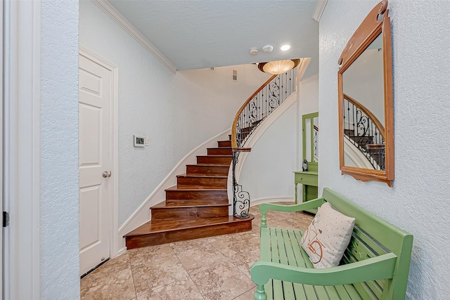 stairway with tile patterned flooring and a textured ceiling