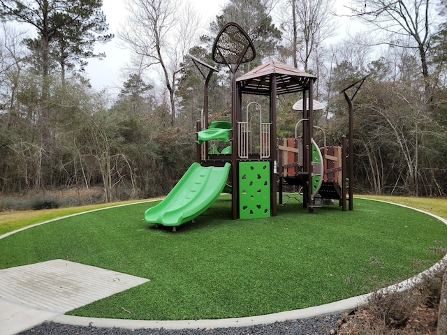 view of jungle gym featuring a yard