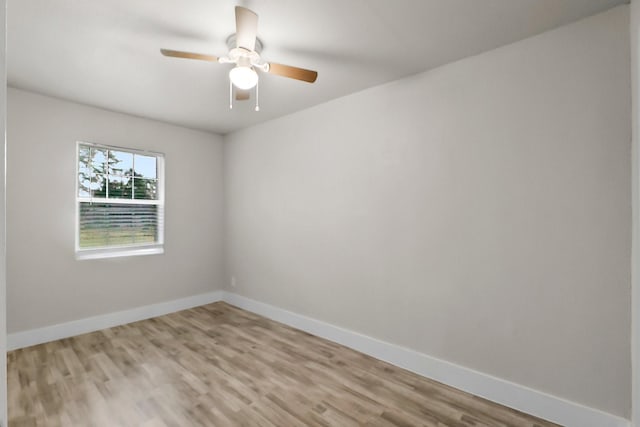 spare room featuring ceiling fan and light hardwood / wood-style floors