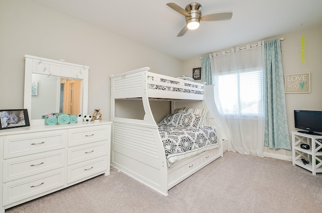 bedroom featuring ceiling fan and light colored carpet