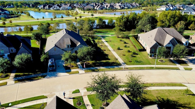 aerial view with a water view and a residential view