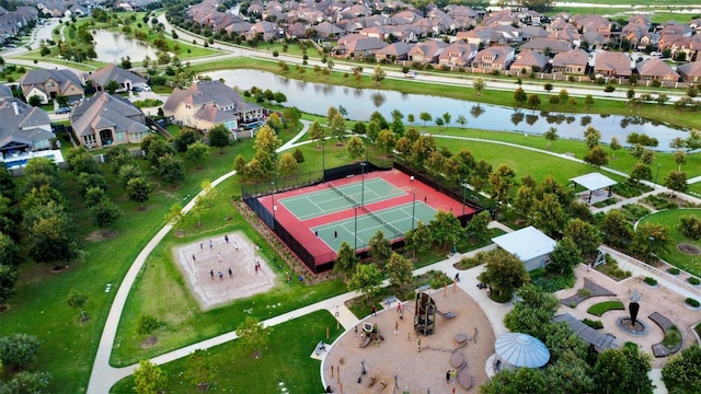 bird's eye view with a water view and a residential view