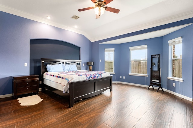 bedroom featuring crown molding, vaulted ceiling, and ceiling fan