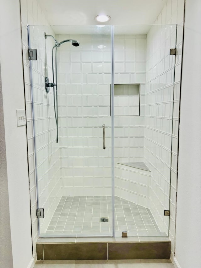 bathroom featuring walk in shower