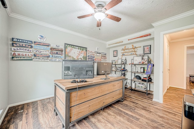 office area featuring ceiling fan, crown molding, a textured ceiling, and wood-type flooring