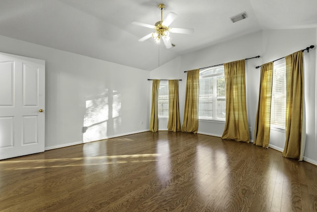 empty room with ceiling fan, dark wood-type flooring, and lofted ceiling