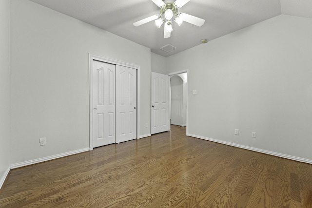 unfurnished bedroom featuring a closet, ceiling fan, and dark hardwood / wood-style floors