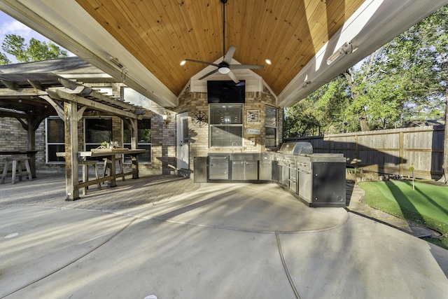 view of patio / terrace featuring area for grilling and ceiling fan