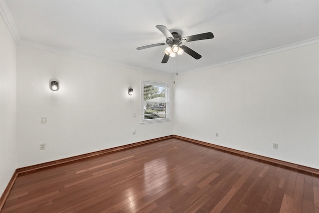 spare room with ceiling fan, wood-type flooring, and crown molding