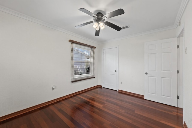 unfurnished bedroom featuring ceiling fan, ornamental molding, and dark hardwood / wood-style flooring