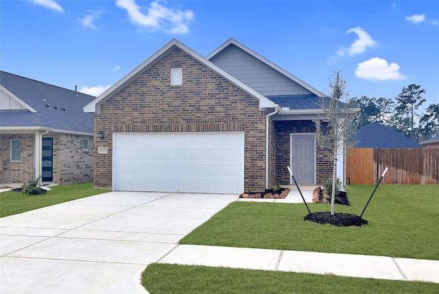 single story home with a garage, a front yard, brick siding, and fence