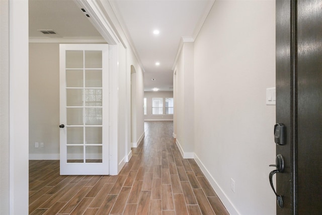 hallway with crown molding