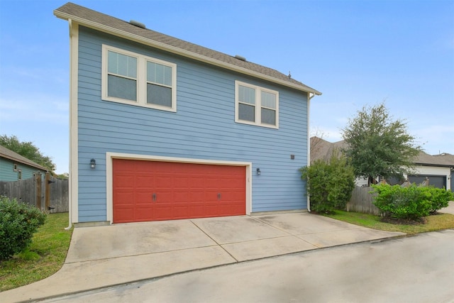 view of home's exterior featuring a garage