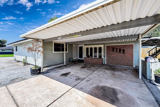 view of patio / terrace with a carport